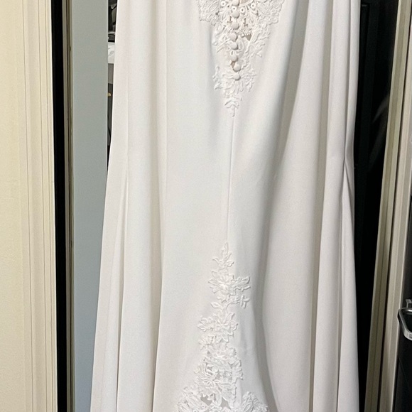 New wedding dress. Only tried on. No alterations have been done to this item. - Picture 3 of 9